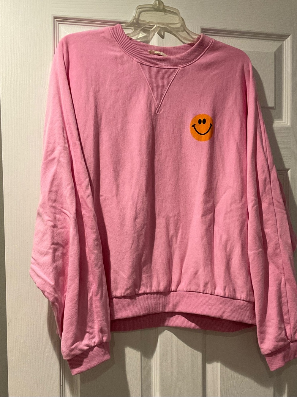 easel Pink Crewneck Sweatshirt with Orange Smiley